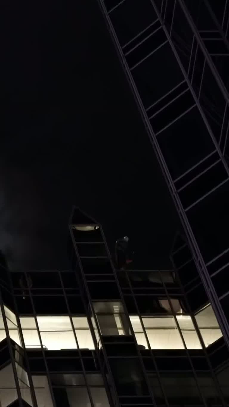 Caped Figure Leaps From PPG Place Tower at Night, Caught on Video