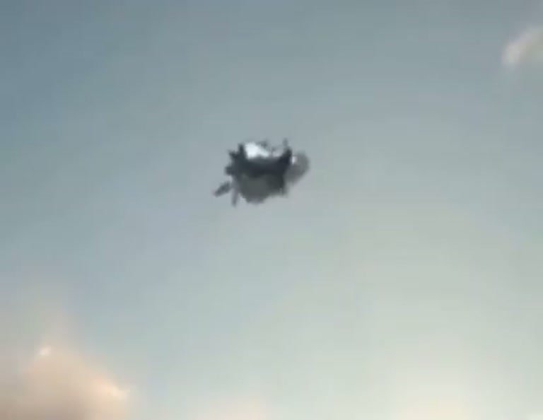 Dark Object Drifts Over City Skyline in New UFO Footage
