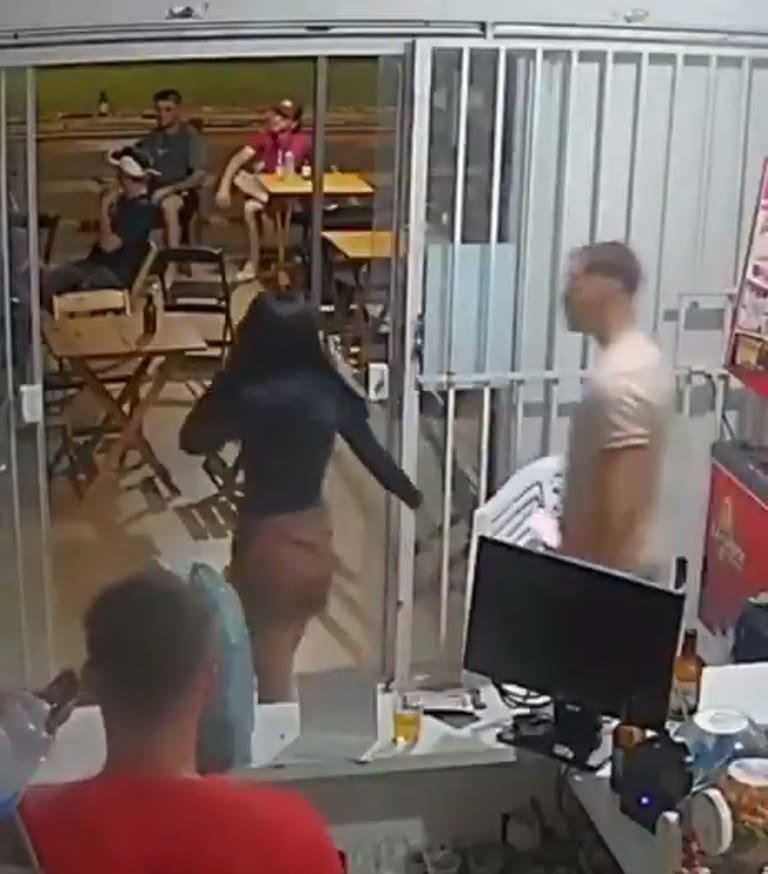 CCTV Captures Tense Exchange Inside a Small Bar as a Voice Says Sorry