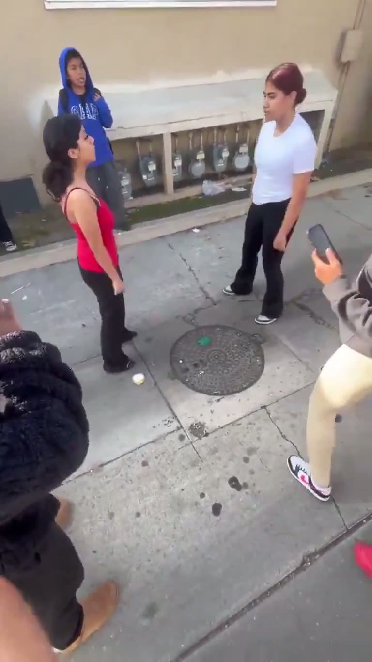 A Sidewalk Standoff Turns Into a Brawl as Phones Come Out