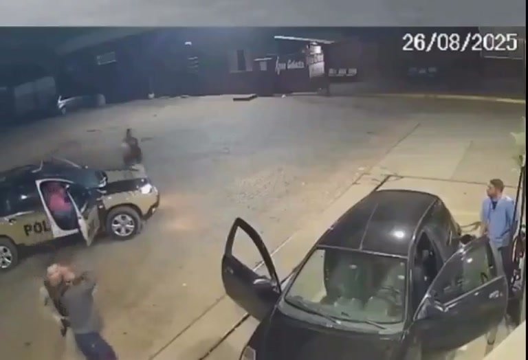 Night Footage Captures Police Scuffle in a Parking Lot