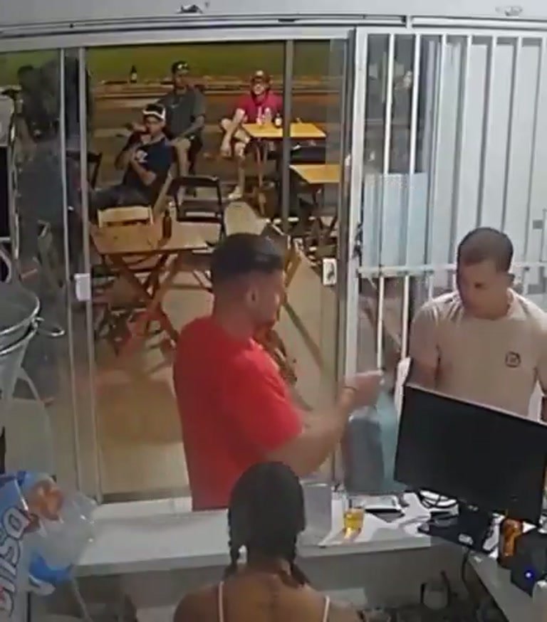 CCTV Captures Tense Exchange Inside a Small Bar as a Voice Says Sorry