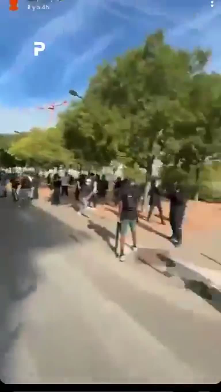 Clips Show Flames and Running Crowds Under an Unverified Claim