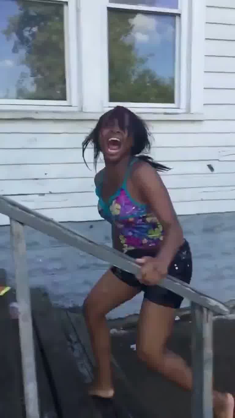 Viral Clip Shows Family's Water Bucket Punishment Over Bullying